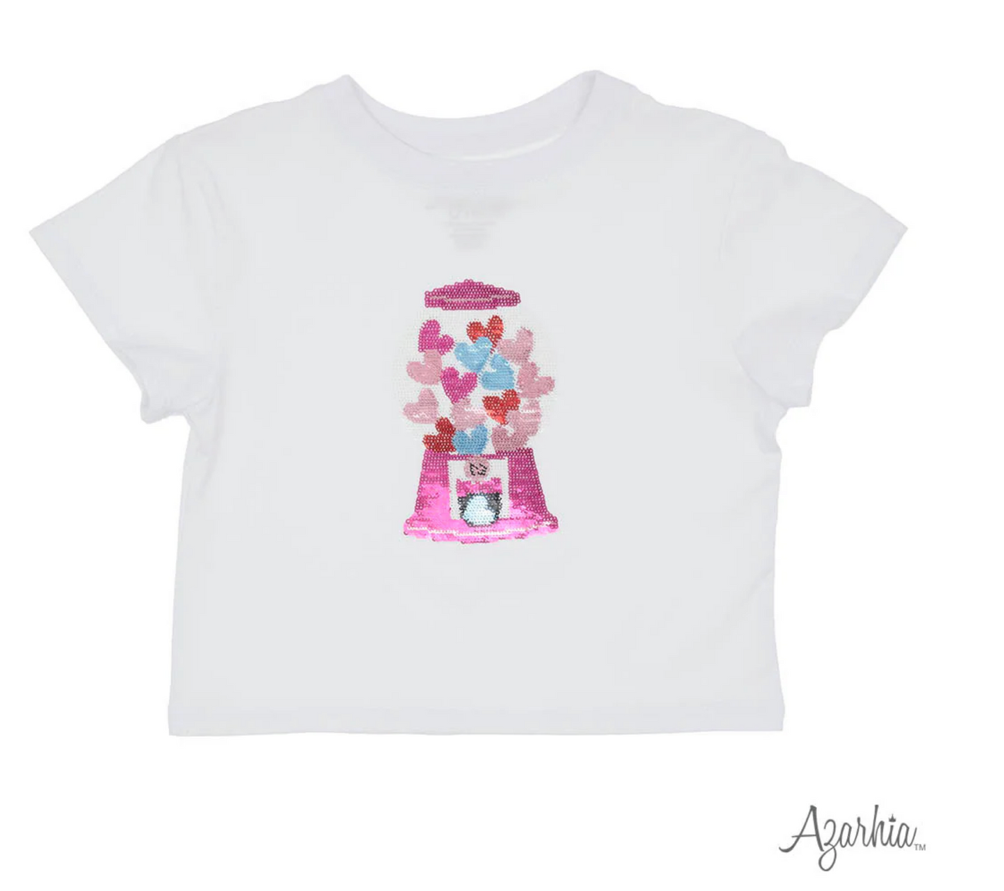 Azarhia's Sequin Gumball Hearts White Boxy T features a pink sequin gumball machine with heart-shaped gumballs in red, pink, and blue, plus an Azarhia logo at the bottom right.