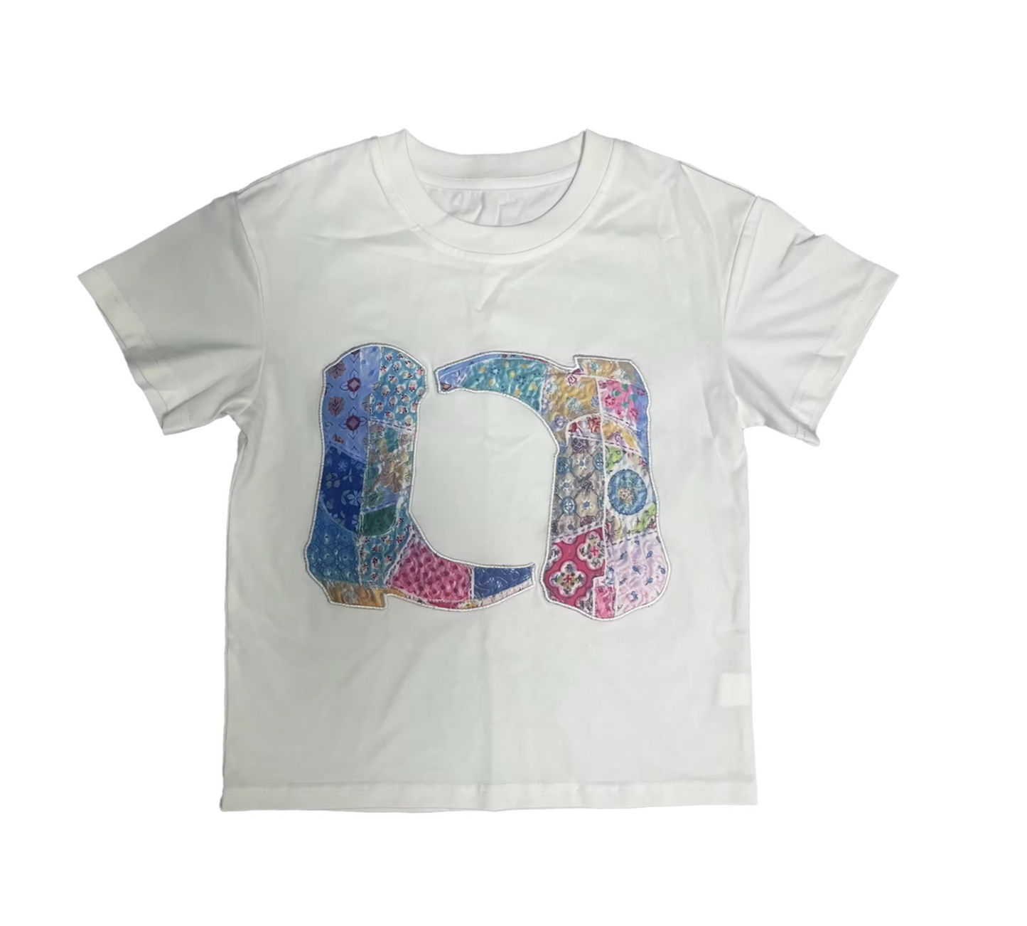 The Patchwork Boots Short Sleeve Tee by Tweenstyle by Stoopher features a bold, colorful patchwork D and J design on a white T-shirt, adding classic Western-inspired flair to any outfit.