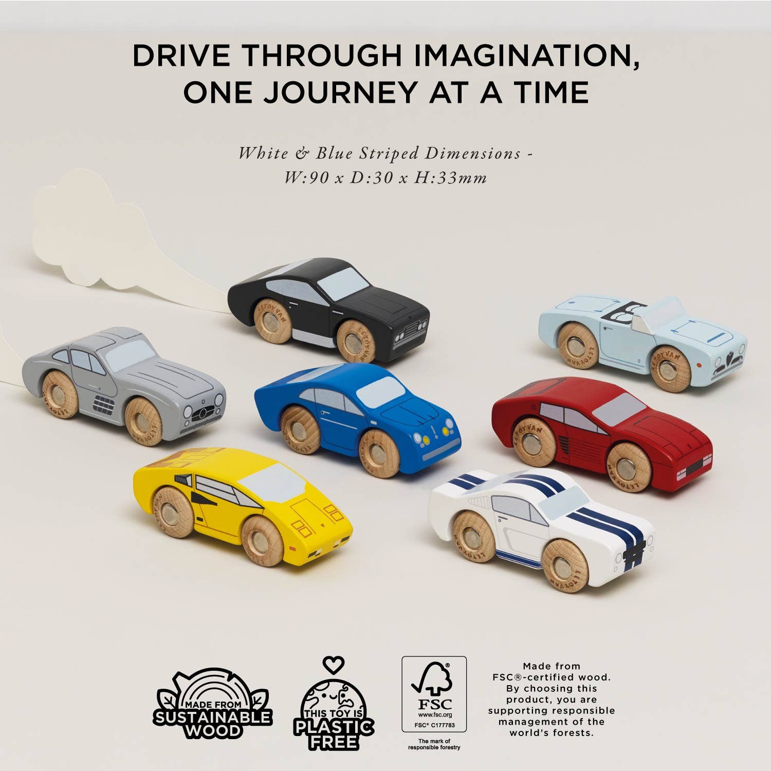 Seven Classic Wooden Sports Cars by Le Toy Van, Inc. are displayed on a light surface with a cloud backdrop. The cars include train track compatible vehicles. Text above says, Drive through imagination, one journey at a time.