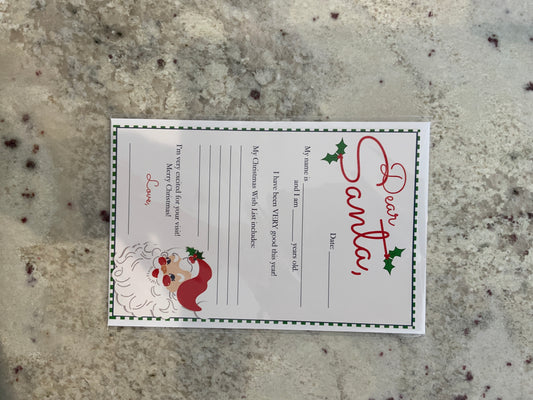 The Cottontail Dear Santa letter template features a cartoon Santa face, holly accents, and fill-in sections for child's name, age, good deeds, wish list, and a closing message—perfect for festive countertop displays.