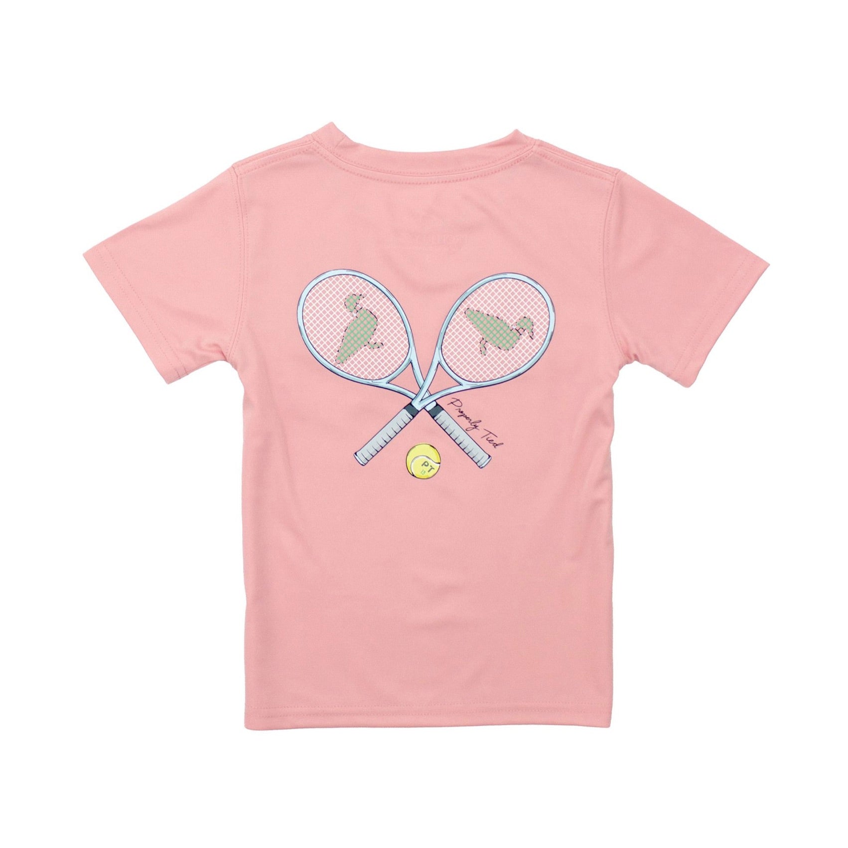 The Properly Tied Girls Performance Tee SS Tennis Blush features two crossed rackets with green tennis balls and small dog silhouettes, printed on soft pima cotton, with text beside the rackets on the back.
