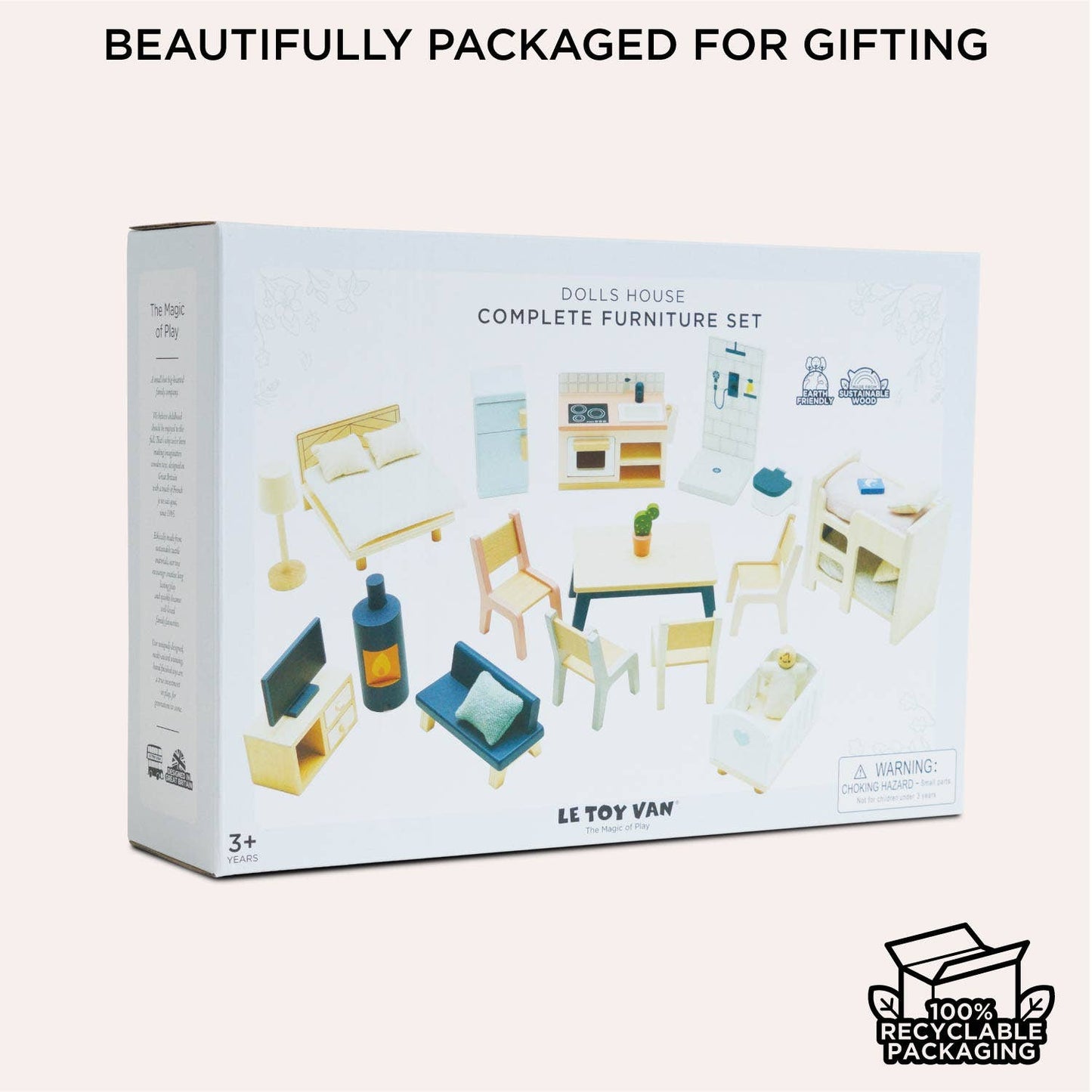 A box labeled “Complete Dolls House Furniture” by Le Toy Van, Inc. displays illustrated mini furniture. The packaging states “BEAUTIFULLY PACKAGED FOR GIFTING” and shows a “100% Recyclable Packaging” symbol.