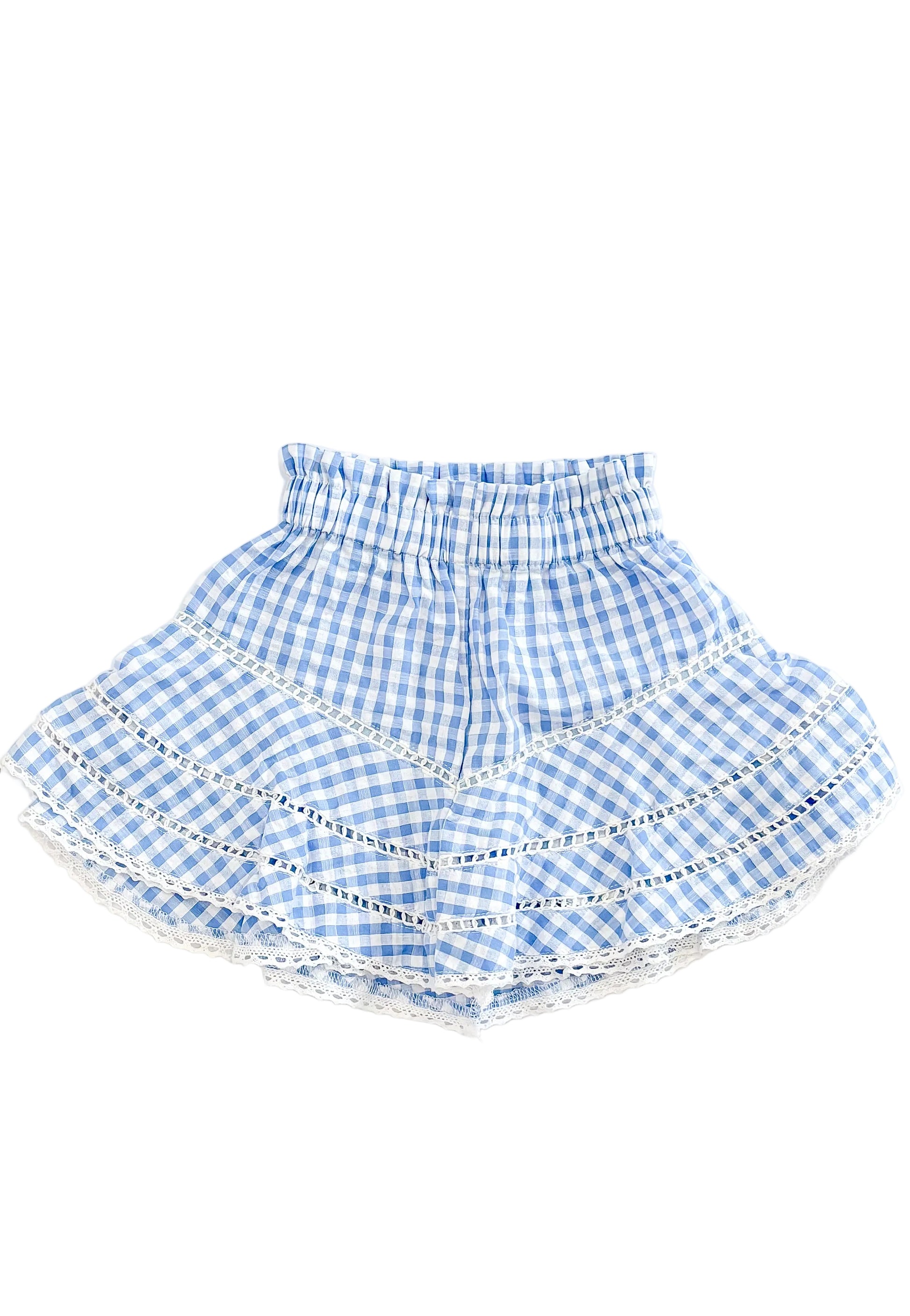 Blue and white checkered skirt with ruffled layers on a white background