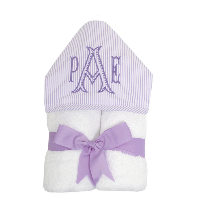 A perfect baby gift, the 3 Martha's Seersucker Stripe Everykid Towel features lavender and white stripes, a hooded design, embroidered initials "PAM," and comes wrapped with a matching lavender ribbon and bow.