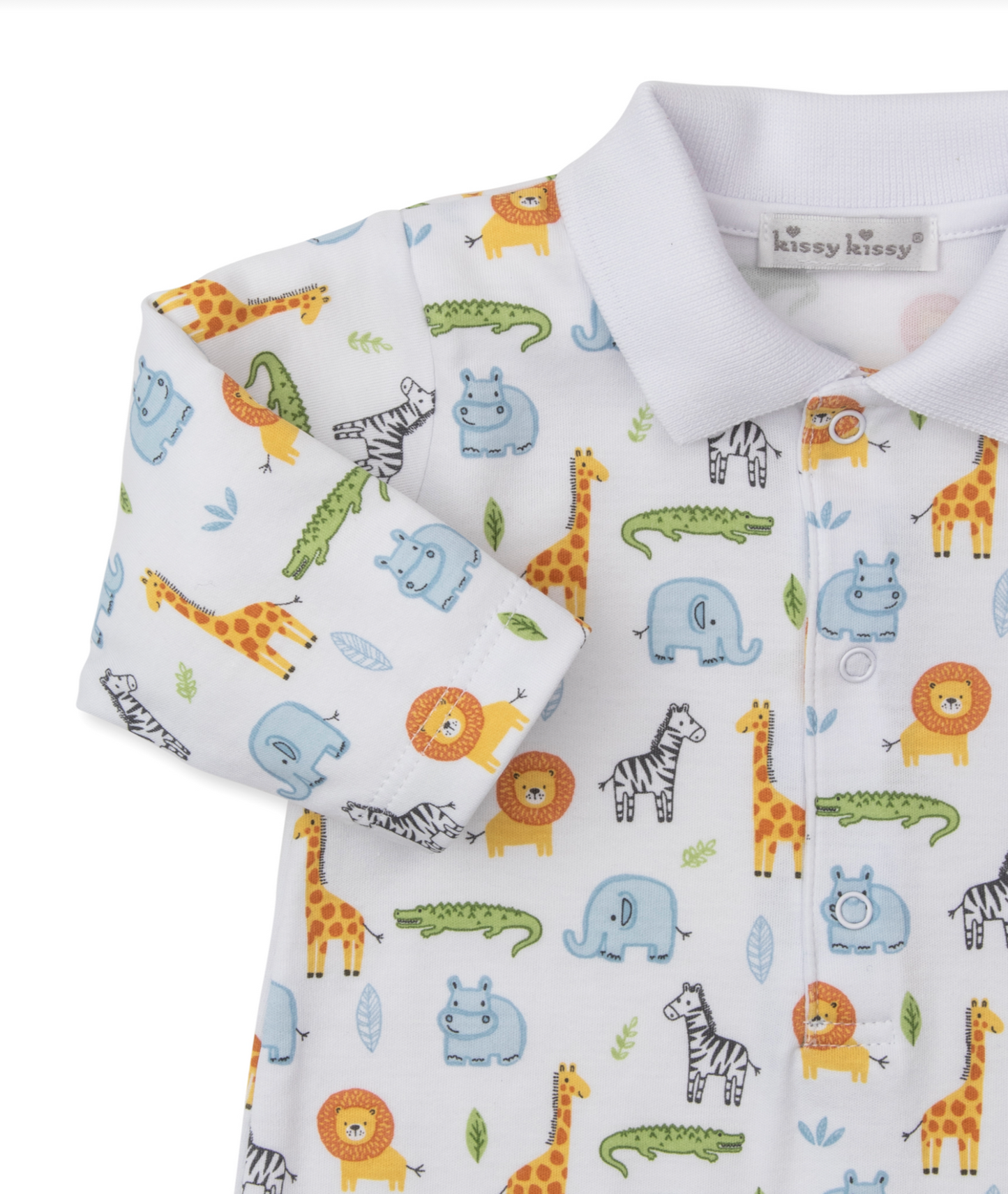 A close-up of the Kissy Kissy Safari Wild Playsuit baby onesie, featuring a collar and playful safari-inspired prints of lions, giraffes, hippos, elephants, crocodiles, and zebras on white fabric.