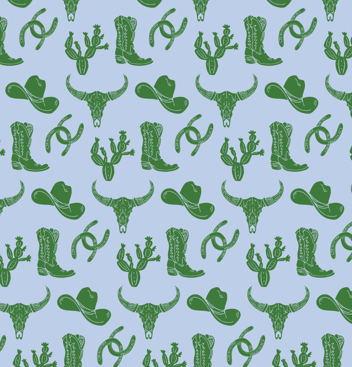 The Lila and Hayes Wildwest Tripp Shortall features a seamless pattern of green cowboy hats, boots, longhorn skulls, cacti, and horseshoes on light blue—perfect for a playful touch to any little one’s cowboy or rodeo outfit.