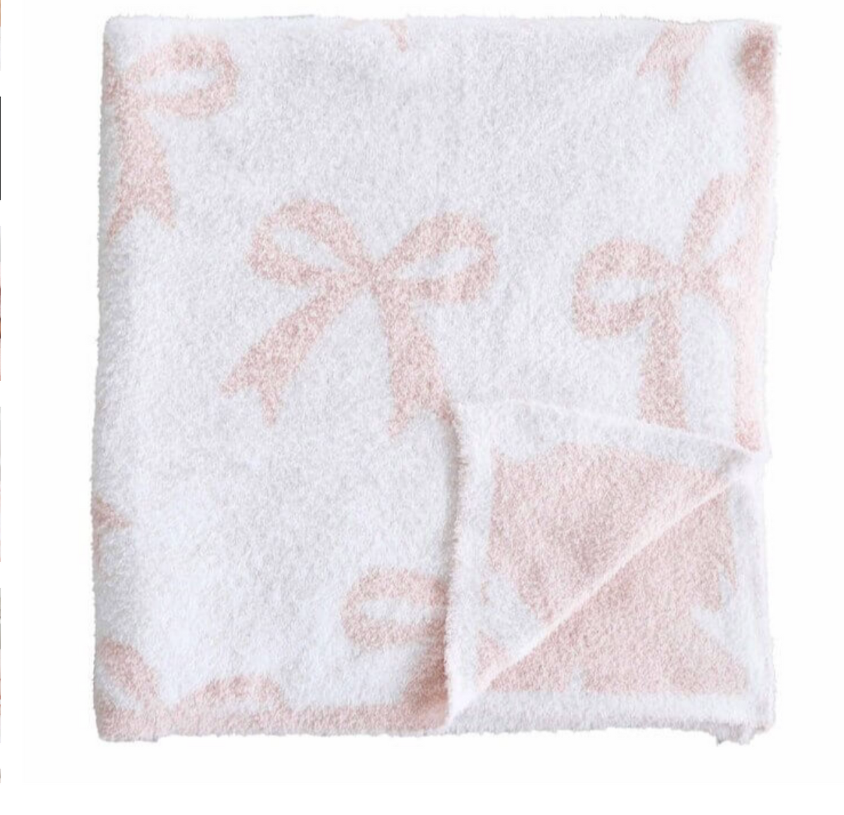 The CuddleLane™ Luxe Blankets | Bows by Caden Lane is a soft, white, square baby blanket featuring light pink bow patterns and a folded corner that reveals the reverse—ideal for stylish nursery décor.