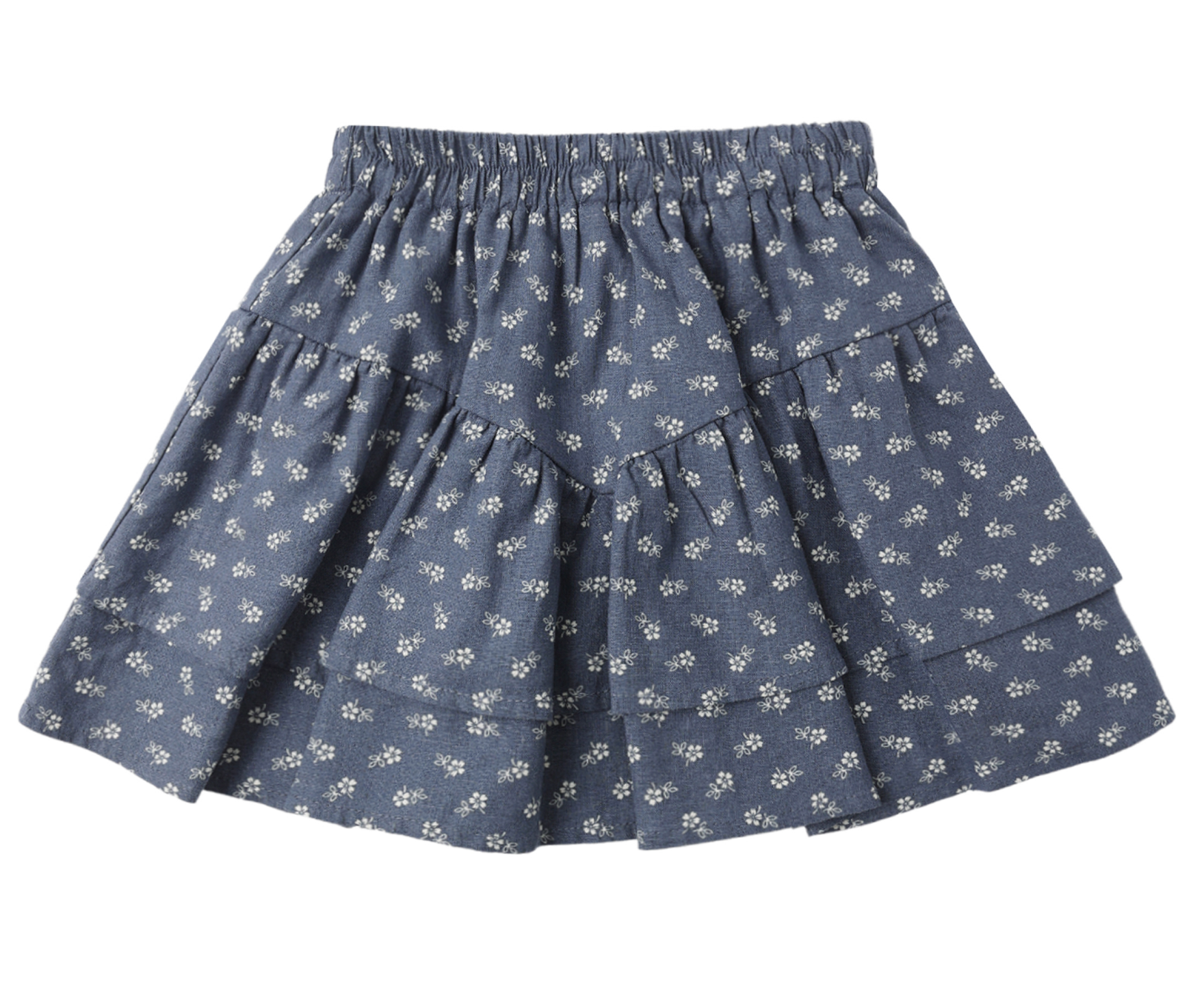 The Rylee & Cru Tiered Mini Ditsy Skirt is a lightweight dusty blue skirt with ruffled tiers, an elastic waistband, and small white floral patterns, shown on a white background.