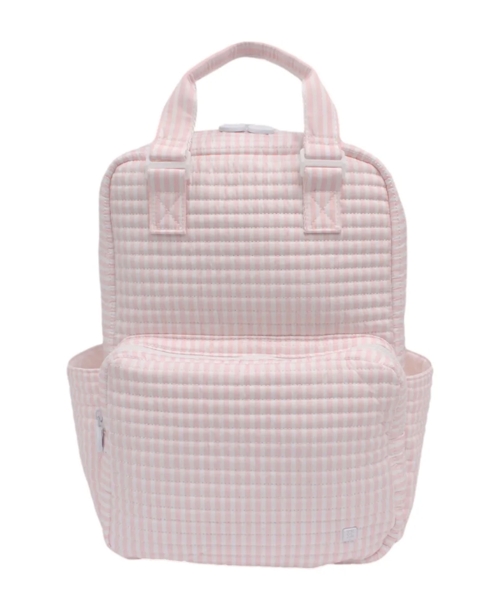The TRVL QUILTED ALL YOU NEED BAG by TRVL features a light pink and white gingham design, quilted texture, two top handles, front zipper pocket, side pockets, and is machine washable for easy care. Displayed against a white background.