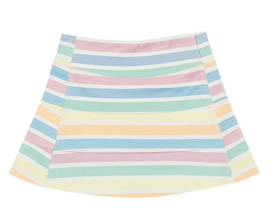 The Belle Cher Striped Tennis Skort for girls features pastel yellow, pink, blue, green, and white horizontal stripes and a slight A-line shape for a playful tennis look. Displayed on a white background.
