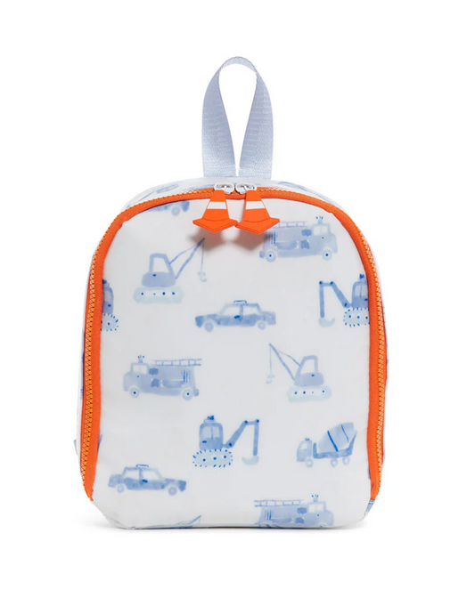 The TRVL Bring It Lunch Bag by TRVL is a small white insulated bag with orange zippers, a gray top handle, and blue trucks and cranes printed all over.