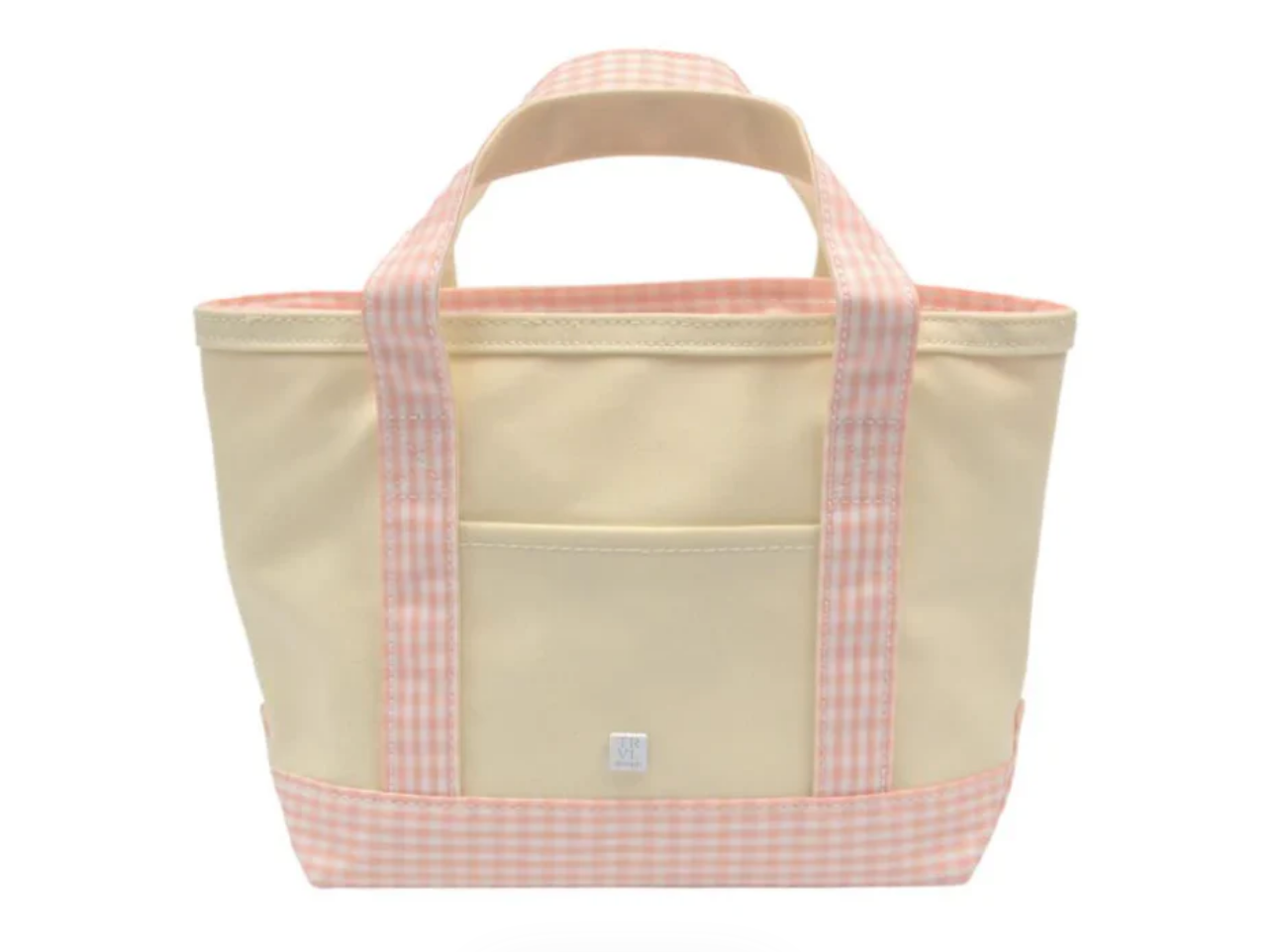 The TRVL Mini Tote by TRVL is an eco-friendly, cream mini tote with light pink gingham handles, a bottom trim, and a front pocket. Its soft pastel look makes it a stylish and simple choice for kids.