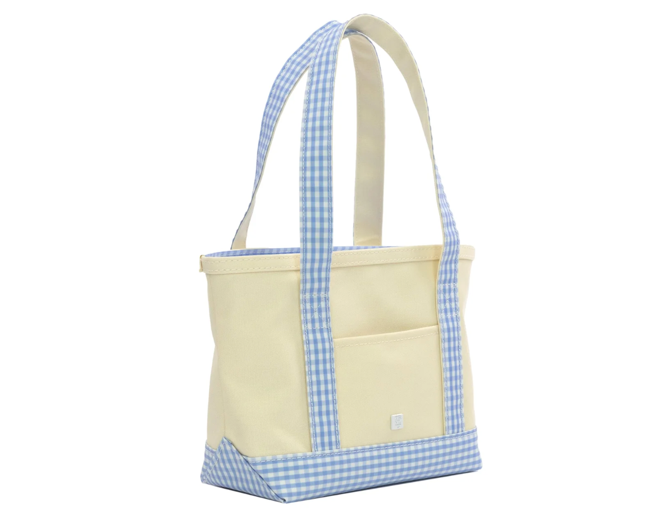 The TRVL Mini Tote by TRVL is a cream mini bag for kids, featuring light blue and white gingham straps, bottom trim, and top edge. Eco-friendly with a handy outside pocket and a practical rectangular shape.