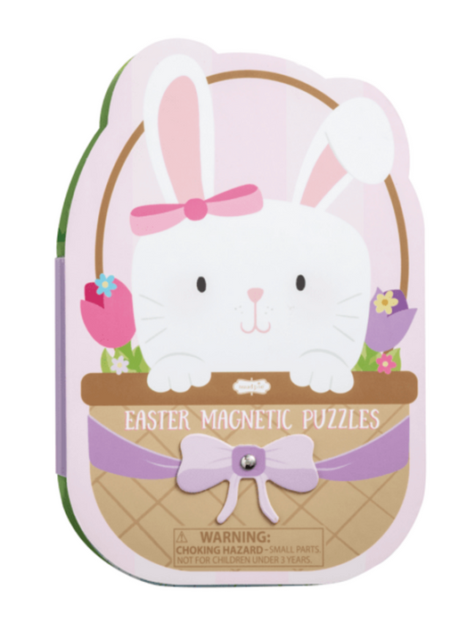 A pastel bunny-shaped box from mudpie, decorated with flowers and a purple bow, holds the Easter Magnetic Easter Puzzle Book. The box features magnetic puzzles and a warning label at the bottom.