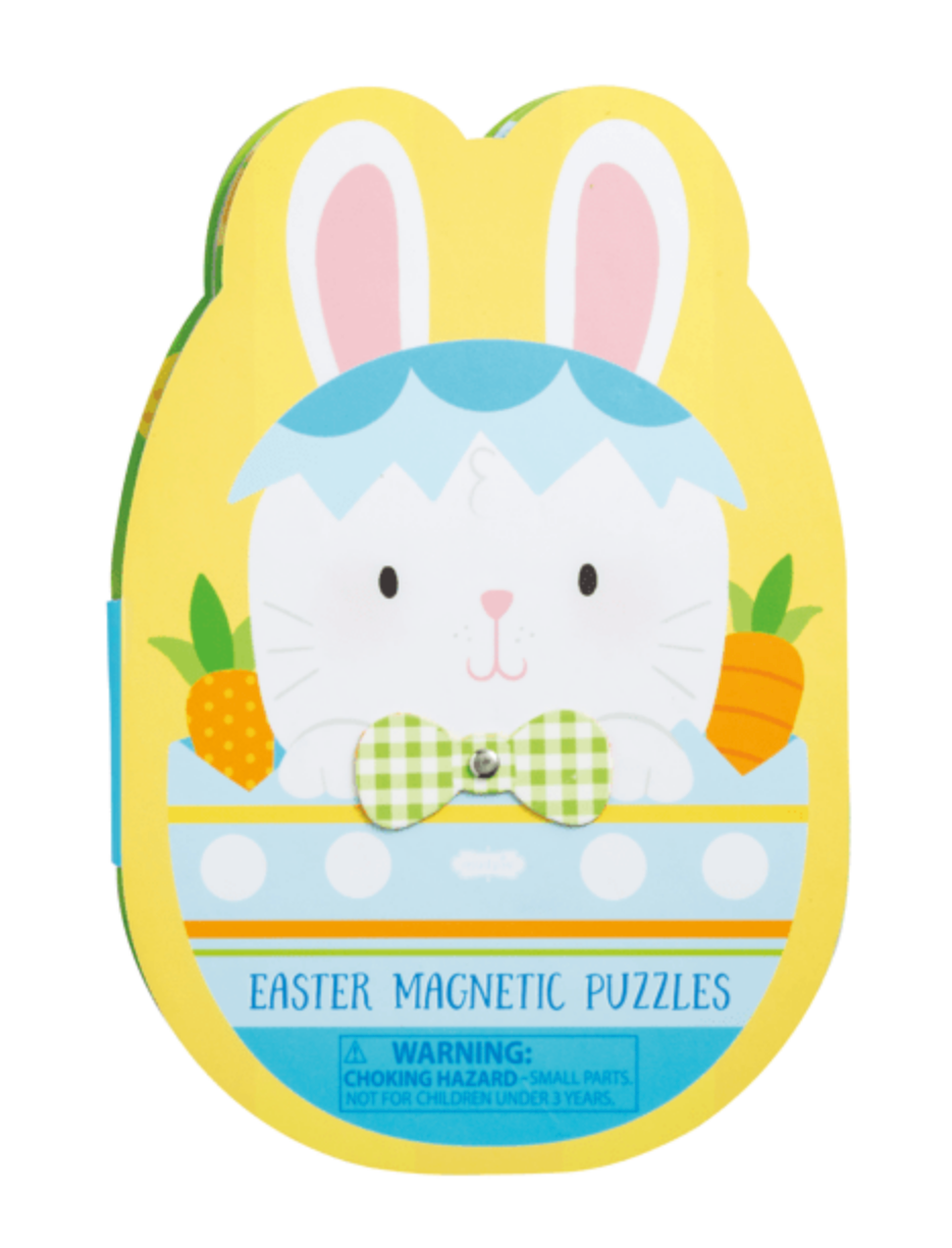 A colorful bunny-shaped tin by mudpie, with a blue eggshell, carrots, and a green checkered bow tie. Labeled "Easter Magnetic Easter Puzzle Book," it contains magnetic puzzles and has a safety warning at the bottom.