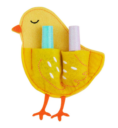 The mudpie Easter Nail Polish Sets feature a cute yellow felt chick with stitched orange details holding two glittery water-based polishes—one blue and one pink—in its pockets, perfect for gifting.