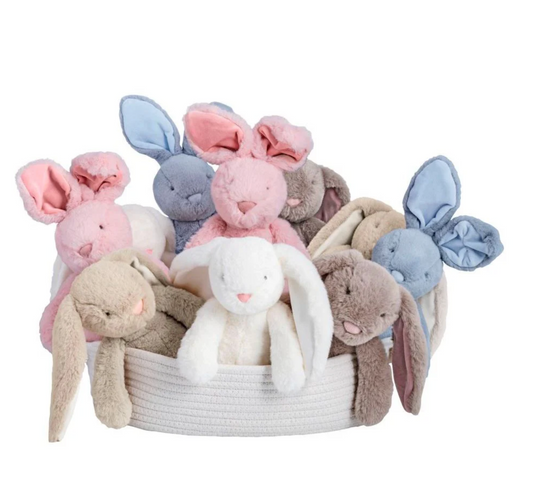 The mudpie Bunny Plush Pal is a soft, fuzzy bunny toy available in pink, blue, gray, white, and beige—perfect as a charming keepsake or a gift for nursery decor and baby showers.