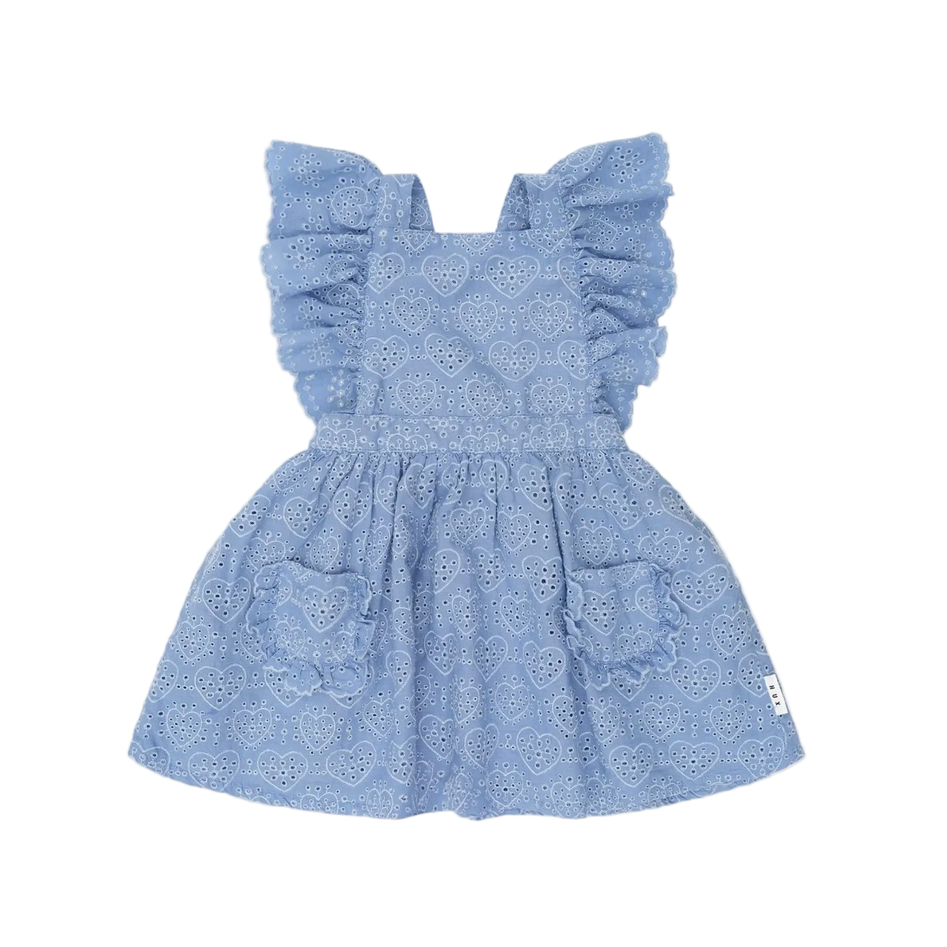 Blue dress with ruffled sleeves on a light pink background