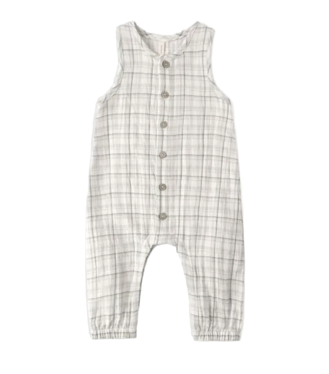 Plaid romper with buttons on a white background