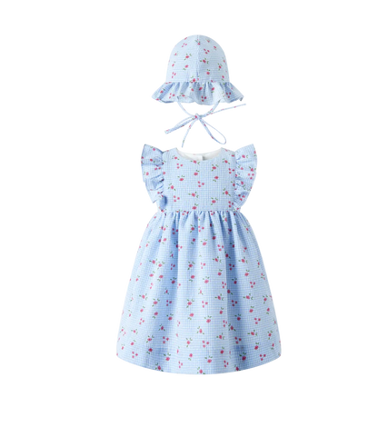 Light blue dress with floral pattern and matching hat on a white background