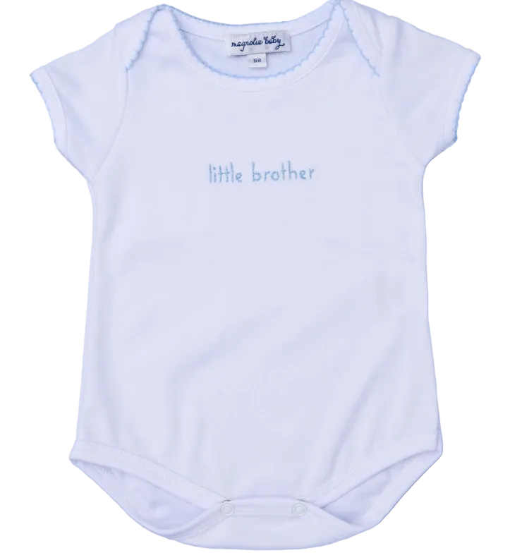 White baby onesie with 'little brother' text on a light blue background