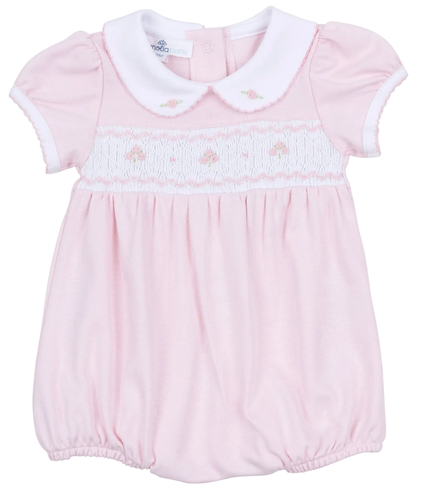 Pink baby romper with white collar on a white background