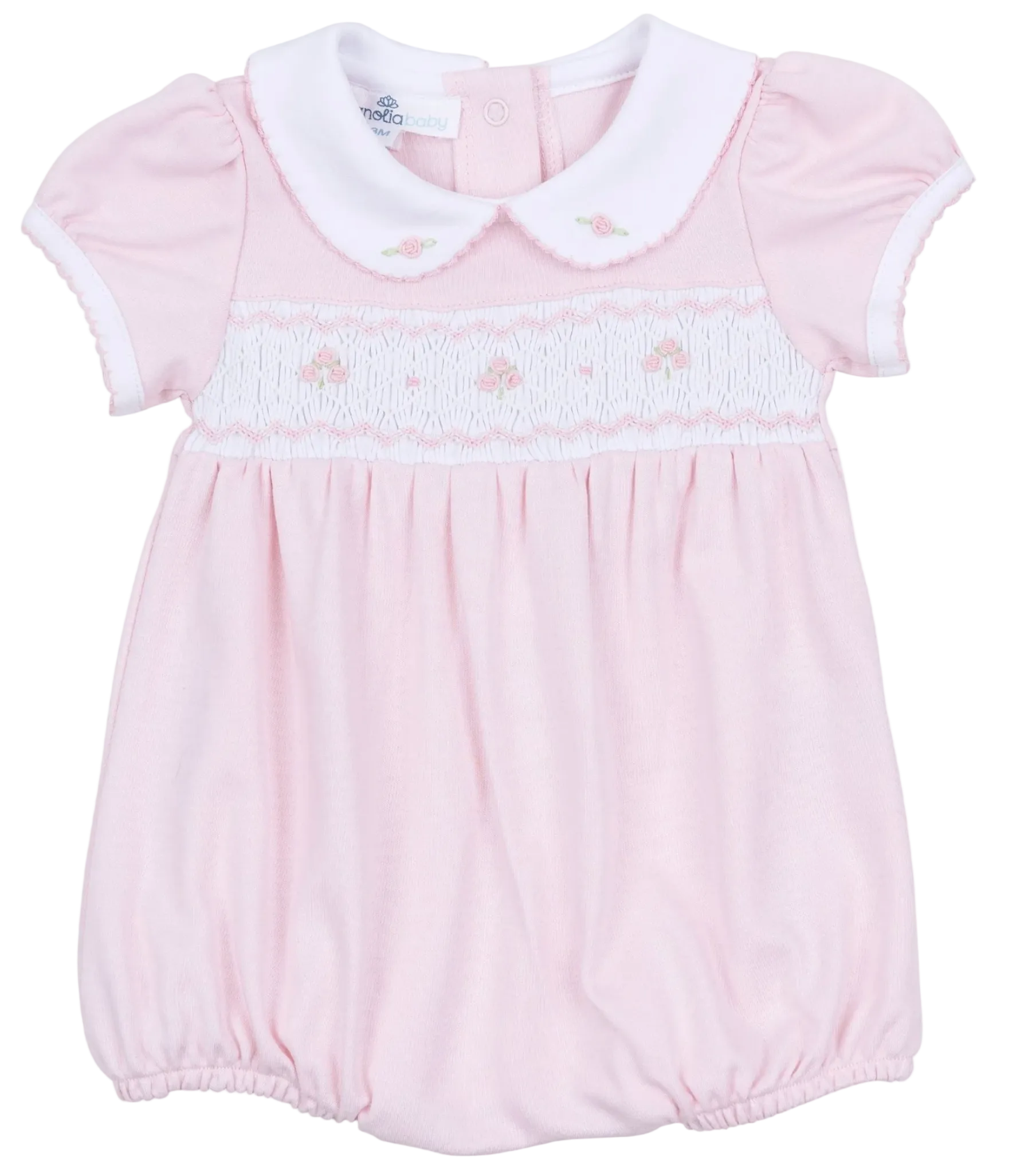 Pink baby romper with white collar on a white background