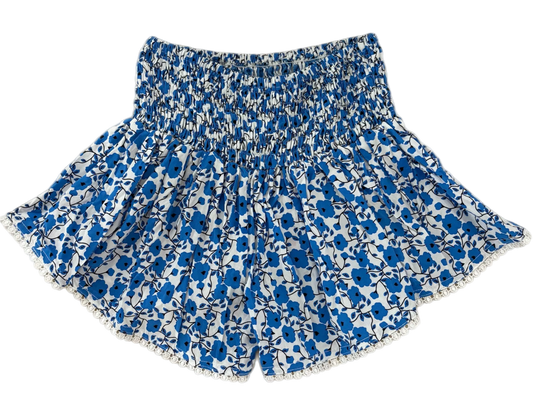 Blue floral shorts on a white background