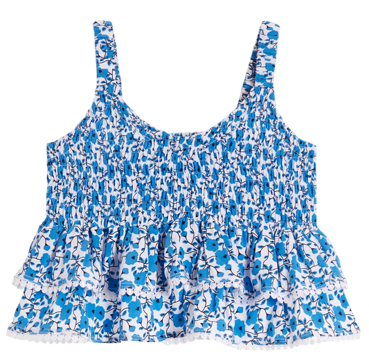 Blue and white floral patterned top on a white background
