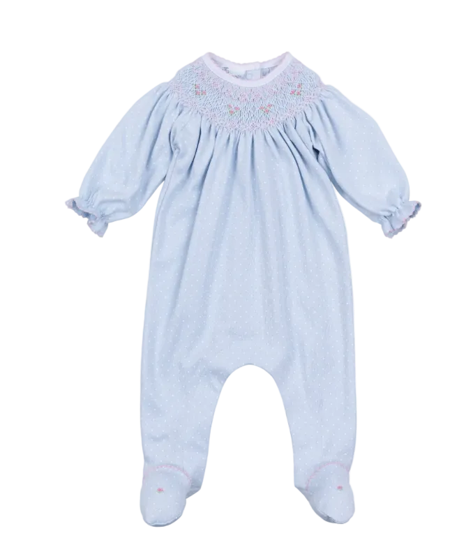 Light blue baby romper with smocked details on a white background