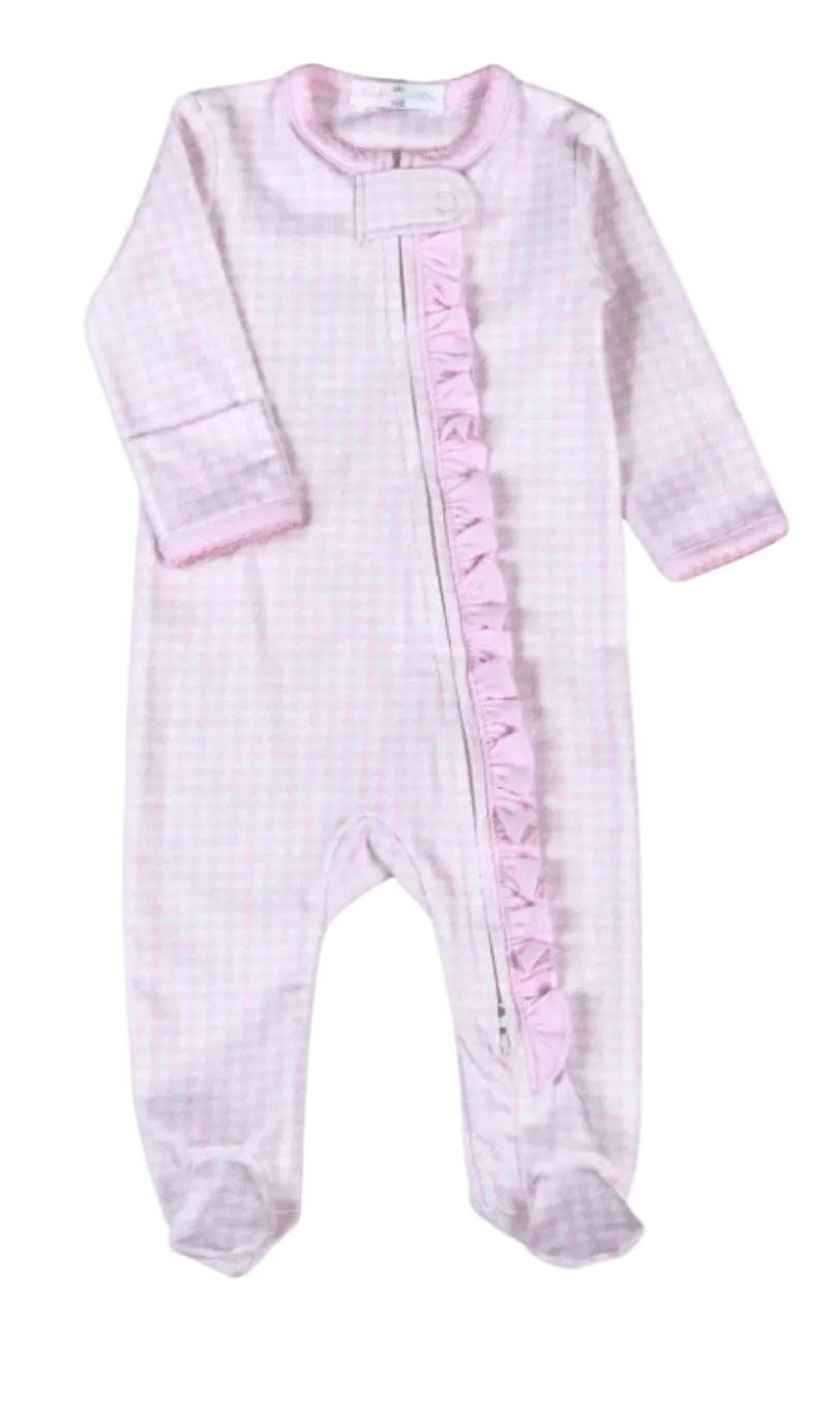 A baby footed sleeper in a light pink and white gingham pattern, featuring a ruffled pink zipper trim down the front.