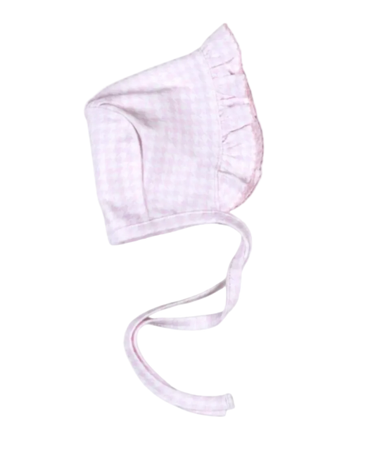 A light pink and white gingham baby bonnet with ruffled trim and adjustable ties, shown on a plain white background.