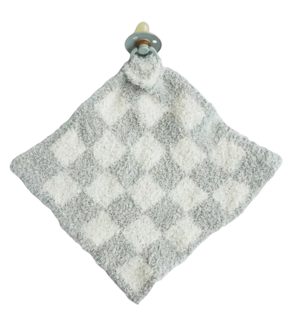A soft, baby security blanket with a gray and white checkered pattern, featuring a plush loop at the top holding a pacifier clip.