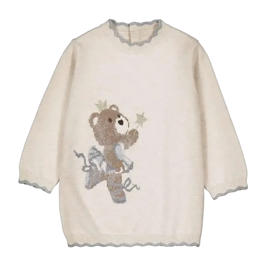 An off-white knit sweater with a scalloped crew neck, cuffs, and hem, featuring a central sequined teddy bear design holding stars.