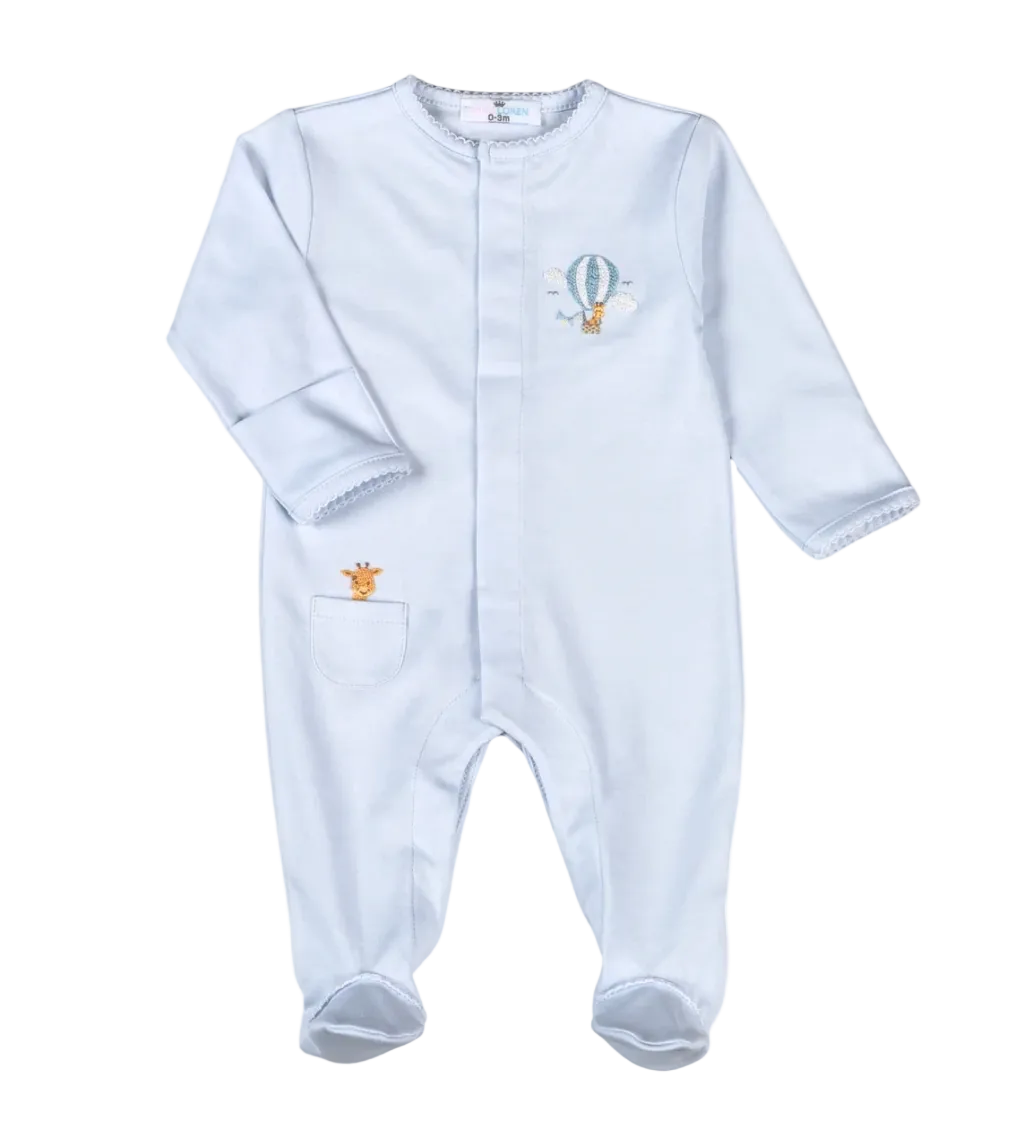 A light blue long-sleeve baby footed sleeper with a small embroidered hot air balloon and giraffe motif on the chest and a side pocket.