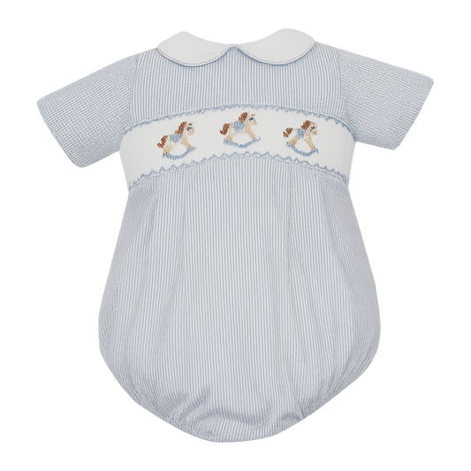 White long-sleeve boy's shirt with Peter Pan collar and red piping