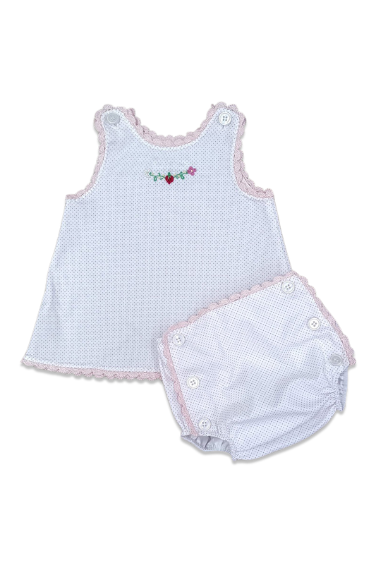 Baby girl's outfit with a sleeveless top and bloomers on a white background